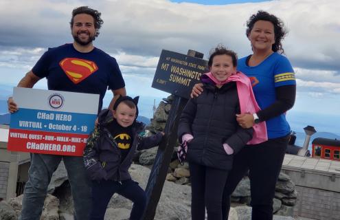 Harrison Family stands on Mt. Washington
